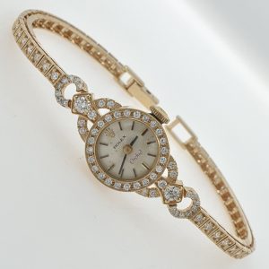 Lady Rolex Vintage Manual Watch 14k Yellow Gold with Natural Diamonds 1950s